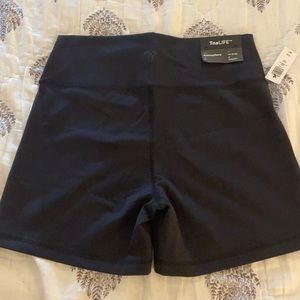 TnaLife Biker Shorts 5” - Aritzia